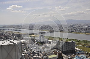 Panoramic view of urban architecture from Umeda Sky Tower of Osaka City in Japan