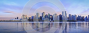 Panoramic view of Vancouver skyline at sunset photo