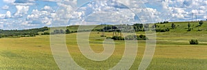 Panoramic view of the vast fields of rapeseed