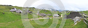 Panoramic view of Velika Planina and mountain cottage hut or house