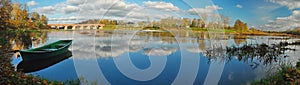 Panoramic view of Venta waterfall, the widest waterfall in Europe and old red brick bridge. Kuldiga, Latvia