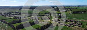 Panoramic view of the Vigsoe town in Denmark with buildings surrounded by grass and trees