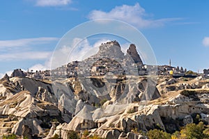 Panoramic view of village and fortress Uchisar in Cappadocia, Turkey. Turkish cave, historic famous place and landscape