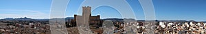 Panoramic view of Villena and the medieval castle of Arab origin of the Atalaya with the mountains in the background.
