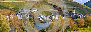 Panoramic view of vineyards and tall church in Merl village of Zell Mosel town, Germany photo