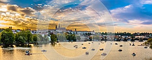 Panoramic view of Vltava river with boats, Prague, Czech Republic