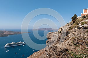 Panoramic view on volcanic caldera from cliff of Santorini island, Greece