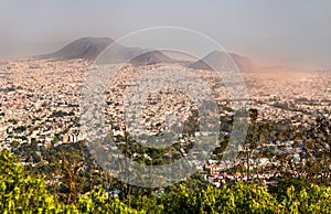 Panoramic view of a volcanic ridge in Mexico City from Cerro de la Estrella National Park photo
