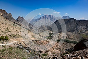 Panoramic view into Wadi Bani Awf from road crossing the Hajar mountain range in Oman photo