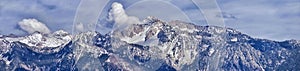 Panoramic view of Wasatch Front Rocky Mountain, highlighting Lone Peak and Thunder Mountain from the Great Salt Lake Valley in ear photo