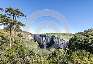 Panoramic view of Waterfall in Itaimbezinho Canyon at Aparados da Serra National Park - Cambara do Sul, Rio Grande do Sul, Brazil photo