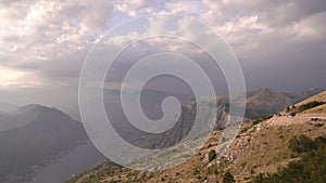 Panoramic view of white clouds in the blue sky over the Bay of Kotor