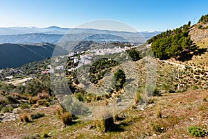 Panoramic view of a white village named AlcaucÃ­n
