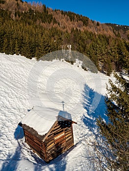 Panoramic view with wood house in winter in resort Ladis, Fiss, Serfaus in ski resort in Tyrol