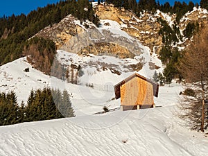 Panoramic view with wood house in winter in resort Ladis, Fiss, Serfaus in ski resort in Tyrol