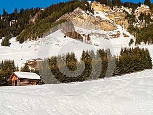 Panoramic view with wood house in winter in resort Ladis, Fiss, Serfaus in ski resort in Tyrol