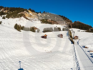 Panoramic view with wood house in winter in resort Ladis, Fiss, Serfaus in ski resort in Tyrol