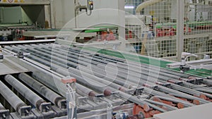 panoramic view in workshop with automatized transport conveyor in plant of ceramic tile