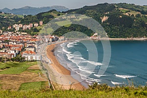 Panoramic view of Zarautz with Guetaria on the background on a b