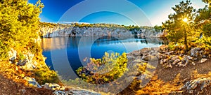 Panoramic view of The Zmajevo oko, Dragon`s Eye lake at sunset photo