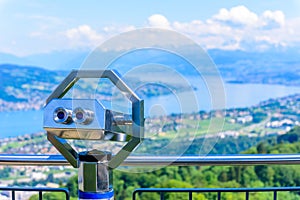 Panoramic view of Zurich lake and Alps from the top of Uetliberg mountain, from the observation platform on tower on Mt. Uetliberg