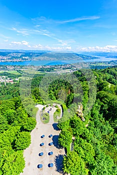 Panoramic view of Zurich lake and Alps from the top of Uetliberg mountain, from the observation platform on tower on Mt. Uetliberg