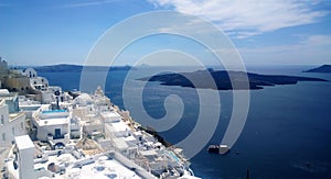 Panoramic views of the coast of Fira in Santorini island on a hot summer day