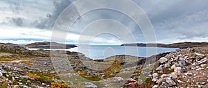 Panoramic views of the sea bay and rocky shores at low tide. Far North, Barents Sea in Russia