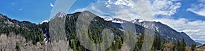 Panoramic Views of Wasatch Front Rocky Mountains from Little Cottonwood Canyon looking towards the Great Salt Lake Valley in early