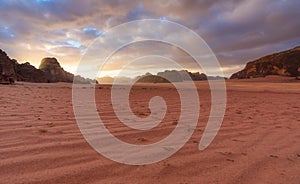 Panoramic Wadi Rum desert landscape in Jordan, in the morning with sunrise