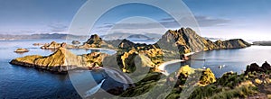 Panoramic warm view at top of `Padar Island` in sunrise late morning from Komodo Island, Komodo National Park, Labuan Bajo, Flor