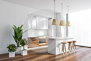 Panoramic white kitchen corner with bar