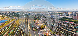 Panoramic wide view rail sorting freight station with various railway cars, with many rail tracks railroad. Aerial view heavy