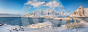 Panoramic winter view on  Reine and Sakrisoya villages  and bridge to Olenilsoya island