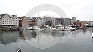 panoramical view of ships in the docks of the port of Tromso in Norway