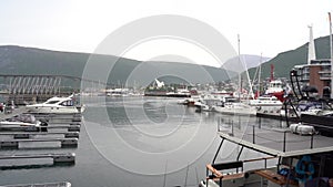 panoramical view of ships in the docks of the port of Tromso in Norway