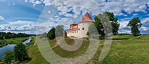 Panoranic view of latvian tourist landmark attraction - ruins of medieval Bauska castle and the remains of a later palace,
