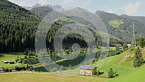 Panormaic view over gerlostal valley with hiking path and european alps (Austria)
