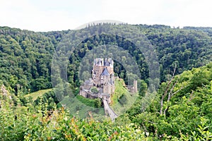 Panoroma with medieval Eltz Castle in the hills above the Moselle, Germany