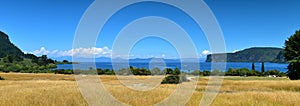 Panoroma view of a scenic bay of Lake Taupo, New Zealand