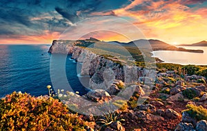 Panotamic view of Caccia cape. Astonishing spring sunrise on Sardinia island, Italy, Europe. Attractive morning seascape of Medite