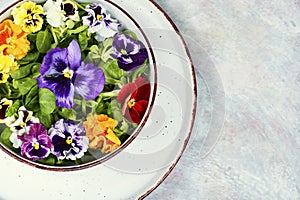 Pansy salad of edible flowers, healthy food