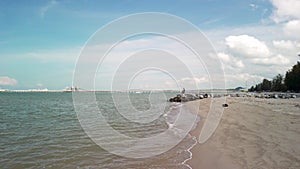Pantai Puteri beach coastal serenity: low-to-high drone shot