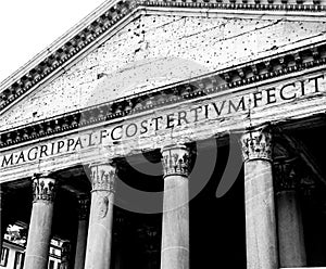 Closeup of pantheon temple entrance facade in black and white , historic ancient architecture of Rome , Italy