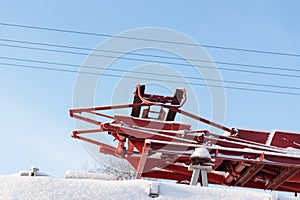 Pantograph and Cables against Blue Sky