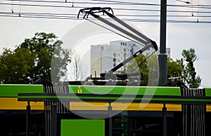 Pantograph on the tramway carriage roof top.