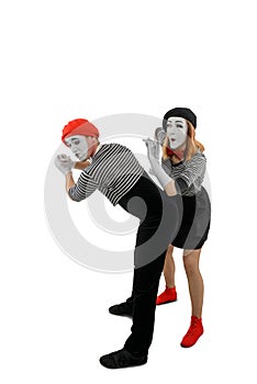 Pantomime sketch of two mimes. Man and woman as mime artists