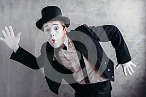 Pantomime theater artist posing, mimic male person