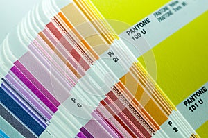 Pantone system. Color samples. Color palette. Cardboard cards with a sample and color code. Selective focus