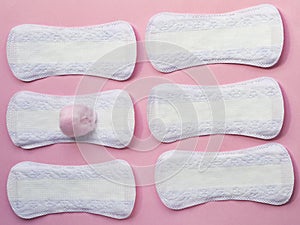 Panty liners on pink background